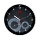 Schwarze Wanduhr mit integriertem Thermometer und Hygrometer.
